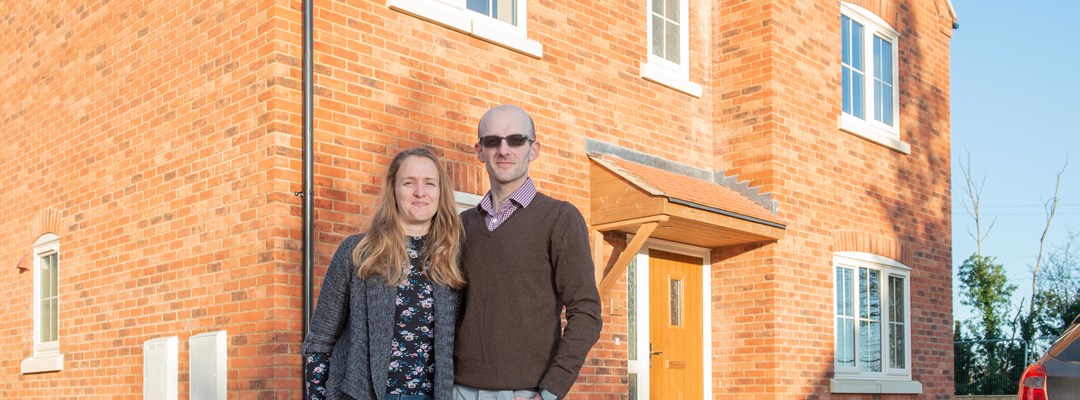 Happy new homeowners move in at Corringham Image